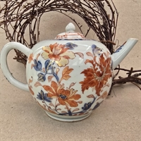 tepotte-kinesisk-blomstermoenster-orange-blaa-hvid-bund-gammel-porcelaens-tekande